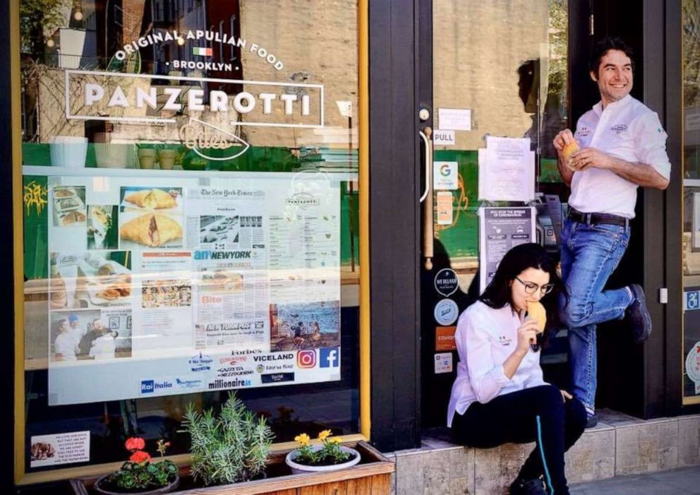 PHOTO: Vittoria Lattanzio and her husband outside of their restaurant, Panzerotti Bites.