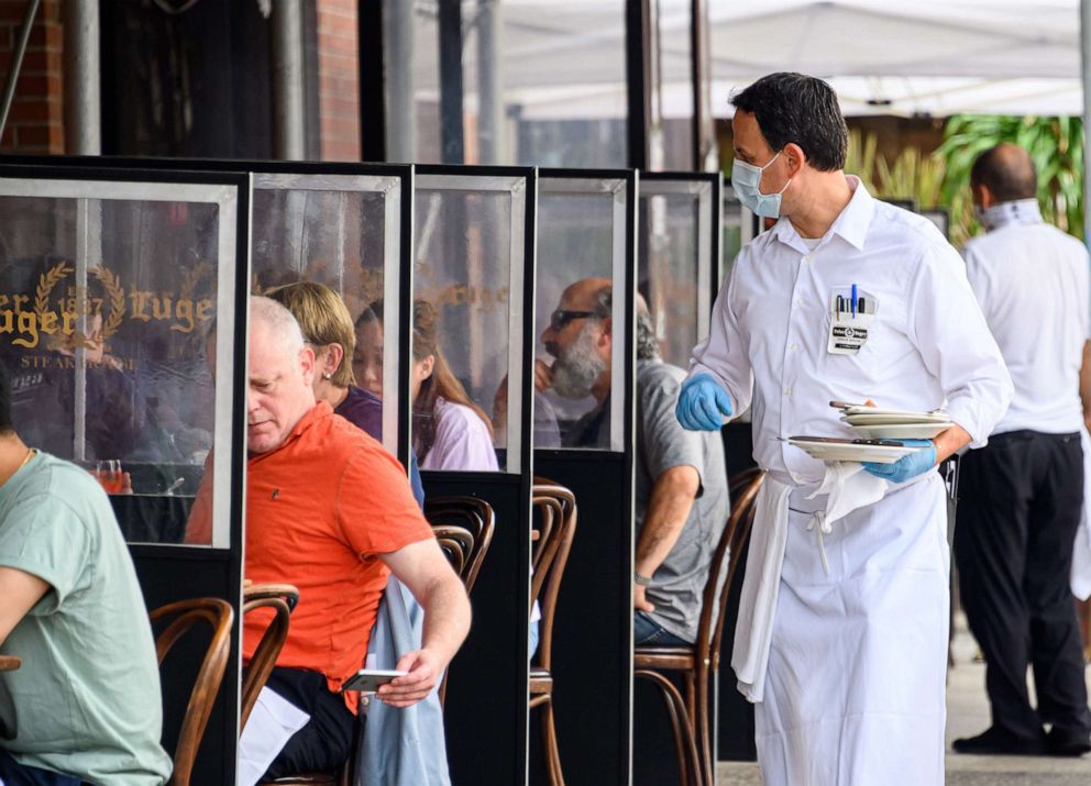 PHOTO: People dine outdoors at a restaurant as Phase 4 of re-opening continues, following restrictions imposed to slow the spread of coronavirus in Williamsburg, N.Y., Sept., 10, 2020.