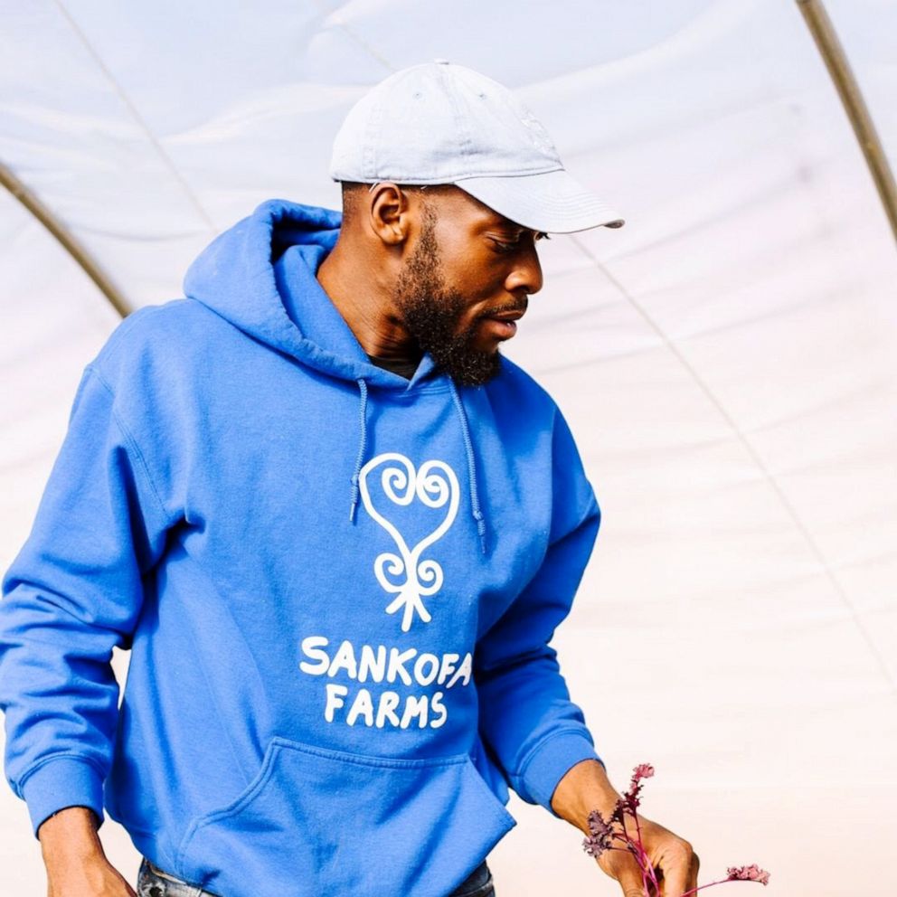 PHOTO: Kamal Bell, founder of Sankofa Farms in Cedar Grove, North Carolina, launched the group in 2016, which offers fresh produce and educates students from different socioeconomic backgrounds about the importance of food production. 