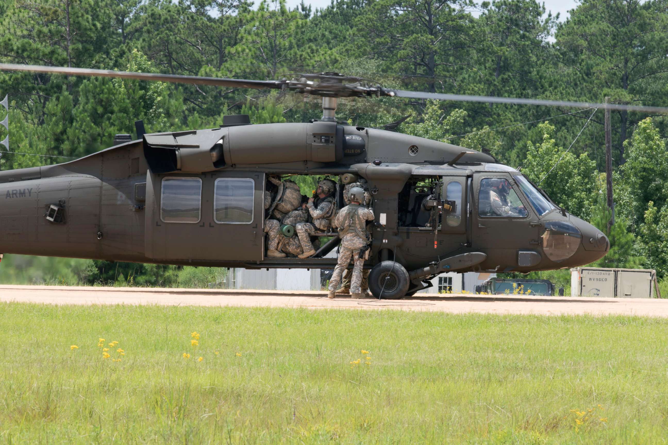PHOTO: Soldiers with the 76th Infantry Brigade Combat Team, Indiana Army National Guard board a UH-60 Black Hawk helicopter at Joint Readiness Training Center, Fort Polk, Louisiana, July 23, 2017.