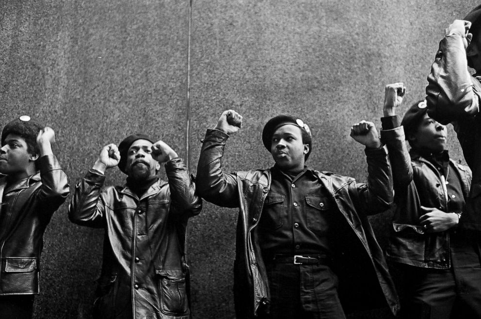 PHOTO: View of a line of Black Panther Party members as they demonstrate, fists raised outside the New York City courthouse, New York, April 11, 1969.