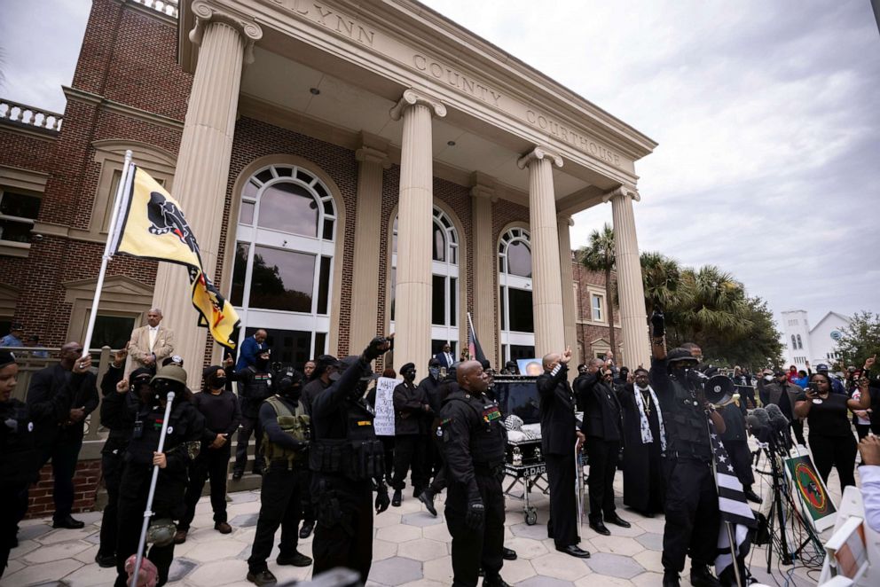 PHOTO: Dozens of Black Lives Matter and Black Panther protesters gather outside the Glynn County Courthouse where the trial of Travis McMichael, his father, Gregory McMichael, and William "Roddie" Bryan is held, Monday, Nov. 22, 2021, in Brunswick, Ga. 