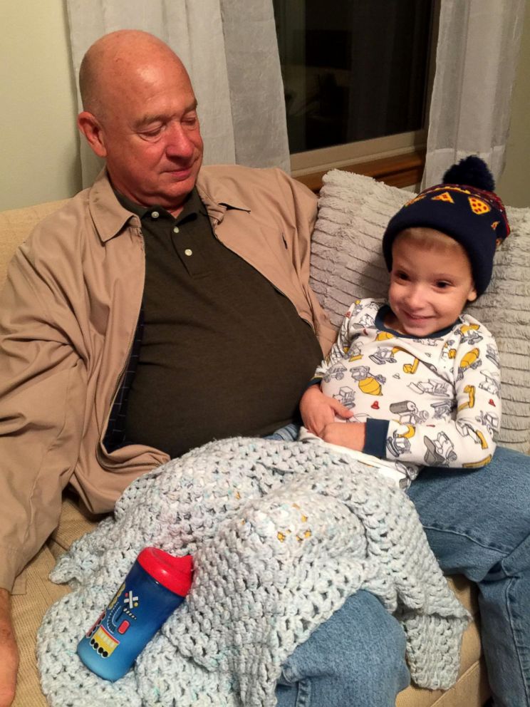 PHOTO: Blake Mompher, 5, and his grandfather Gary Mompher who made the school-bus Halloween costume.