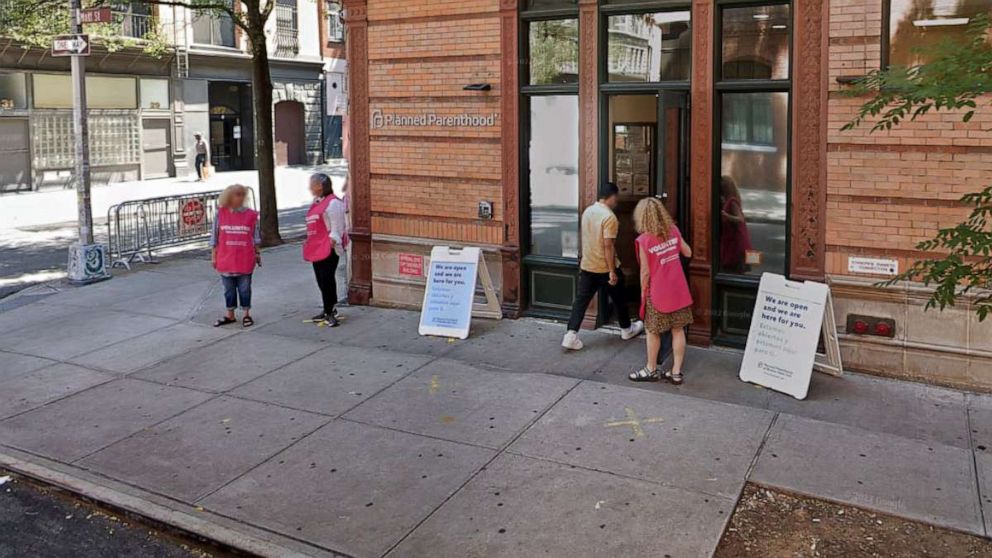 Protesters charged with harassing women entering abortion clinic