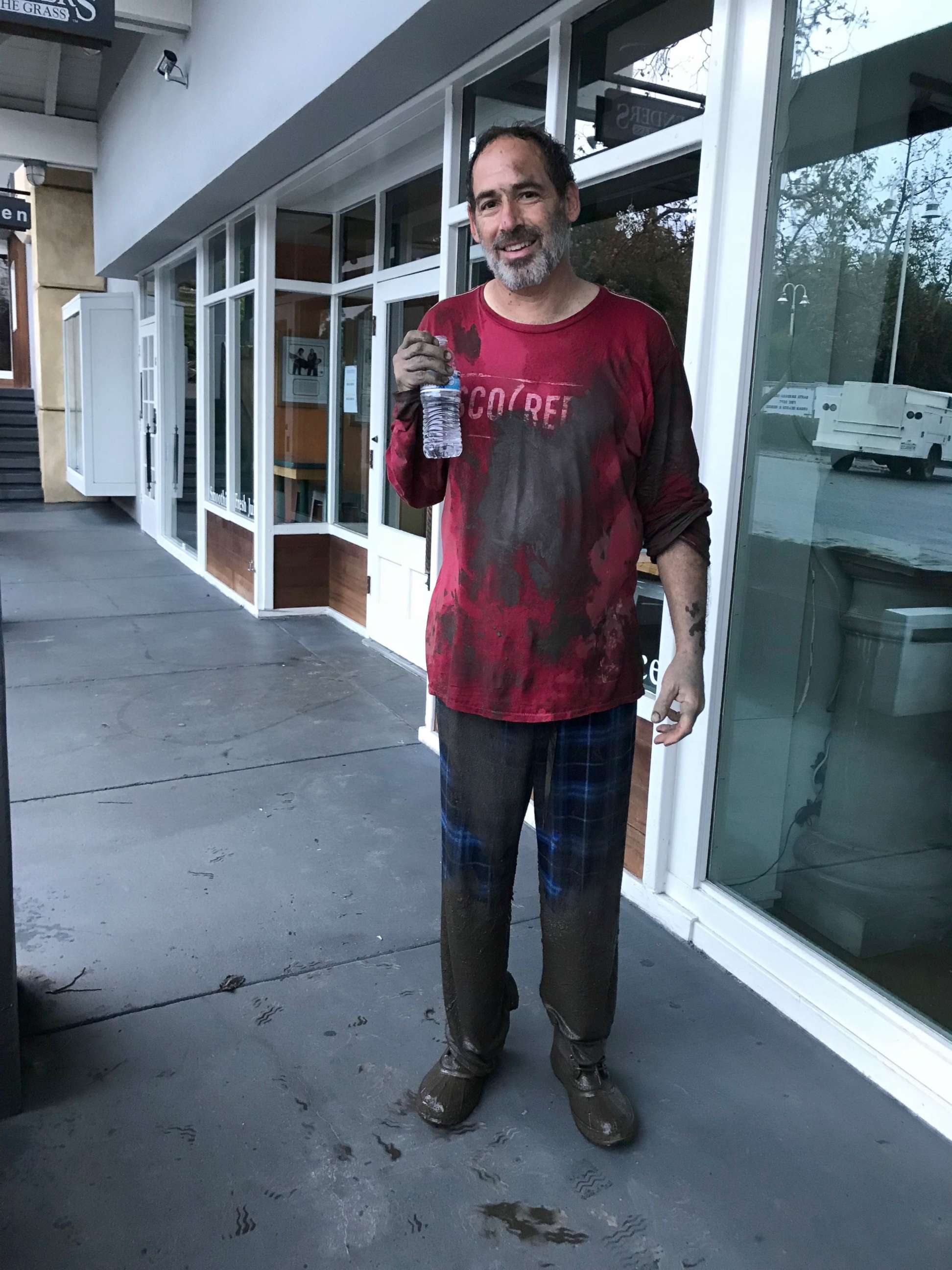 PHOTO: A soaked Jonathan Blinderman helped two of the family's three children and all three dogs from their Montecito home to safety when his parked car plowed through the walls guided by a pool of mud, Jan. 8, 2017. 