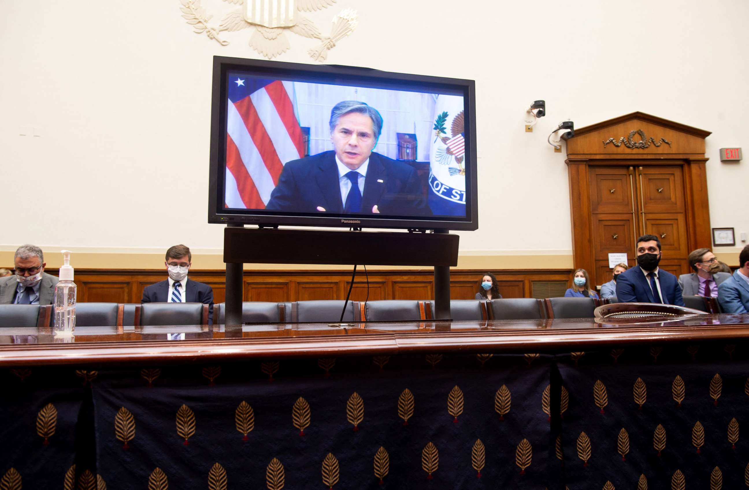 PHOTO: Secretary of State Antony Blinken appears on a television screen as he testifies virtually on the US withdrawal from Afghanistan during a House Foreign Affairs Committee hearing on Capitol Hill in Washington, D.C., Sept. 13, 2021.
