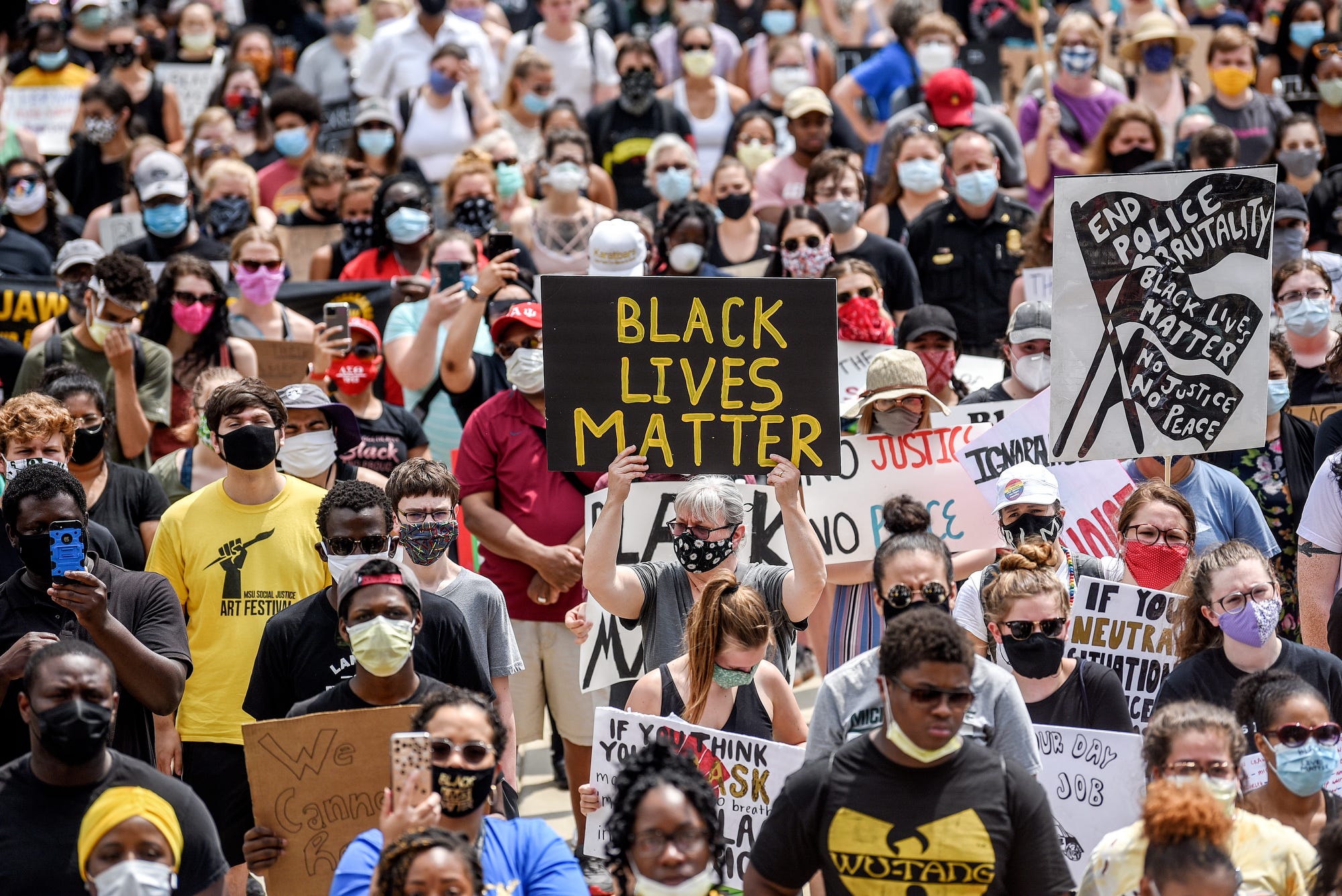 PHOTO: Demonstrators gather at the Michigan State Capitol on Wednesday, June 10, 2020, in Lansing, Mich.