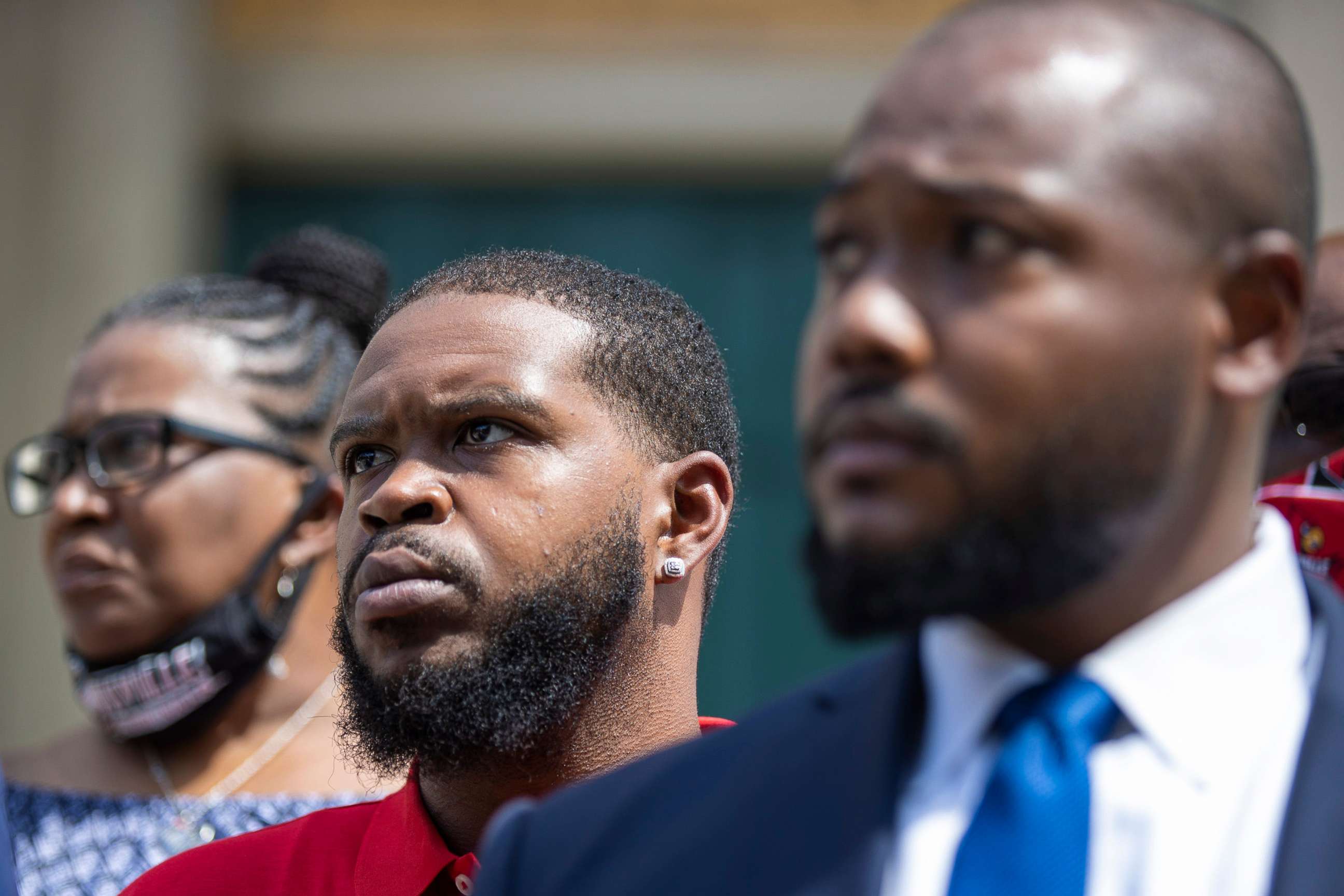 PHOTO: Kenneth Walker, the boyfriend of the late Breonna Taylor, stands between his mother and attorney during a press conference in Louisville, Ky., Sept. 1, 2020.