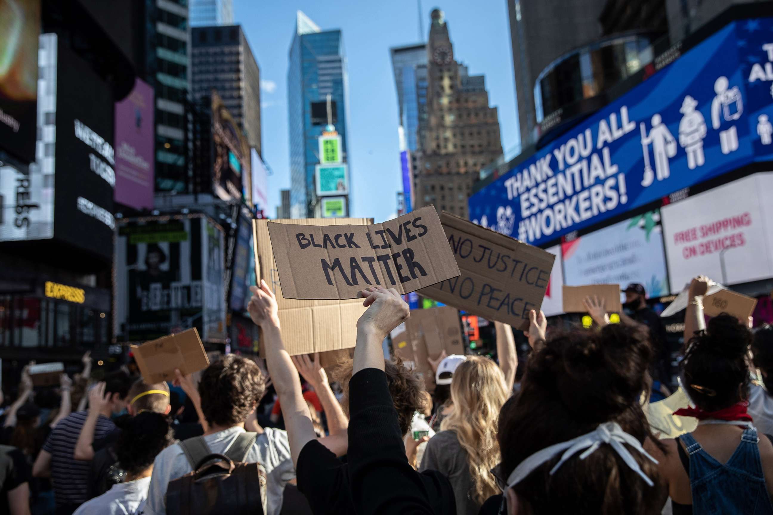 PHOTO: Black Lives Matter protesters kneel in Times Square in Midtown Manhattan on May 31, 2020, in New York City. 