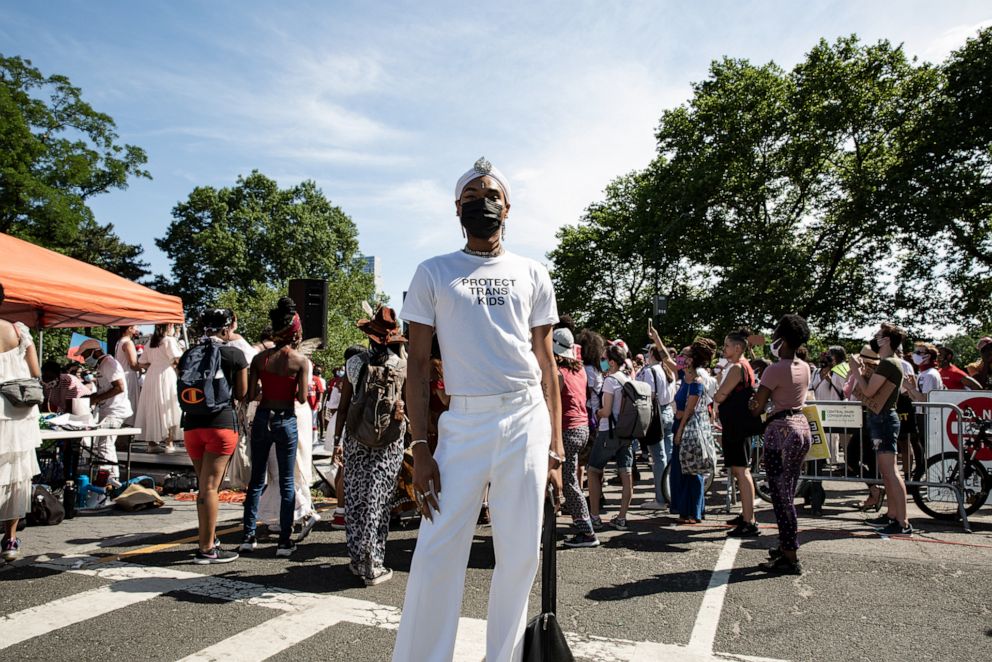 PHOTO: Protesters stand in solidarity with transgender people at the Juneteenth Jubilee in Harlem.