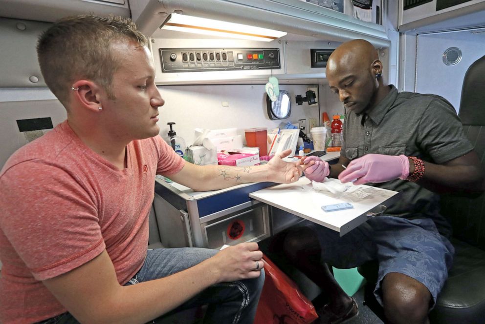 PHOTO: A person is tested during the first gay men's blood drive, held at the Memorial Blood Center in St. Paul, Minn., on July 12, 2013. Participants tried to donate blood, but were turned down due to current federal rules. 