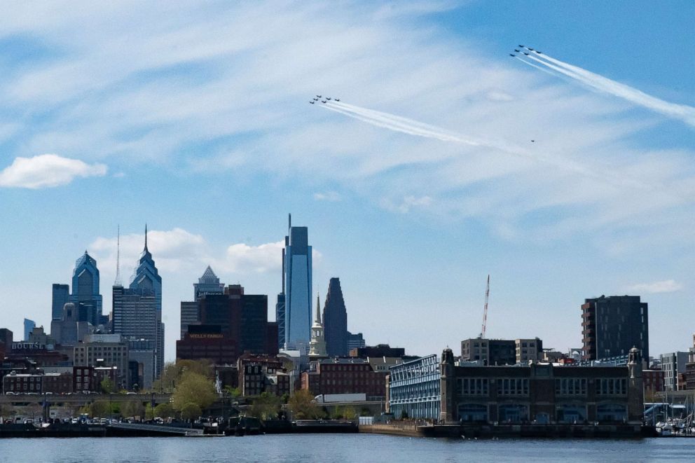 PHOTO: The Navy Blue Angels and Air Force Thunderbirds fly over downtown Philadelphia as a display of solidarity with frontline healthcare and essential workers, April 28, 2020. 
