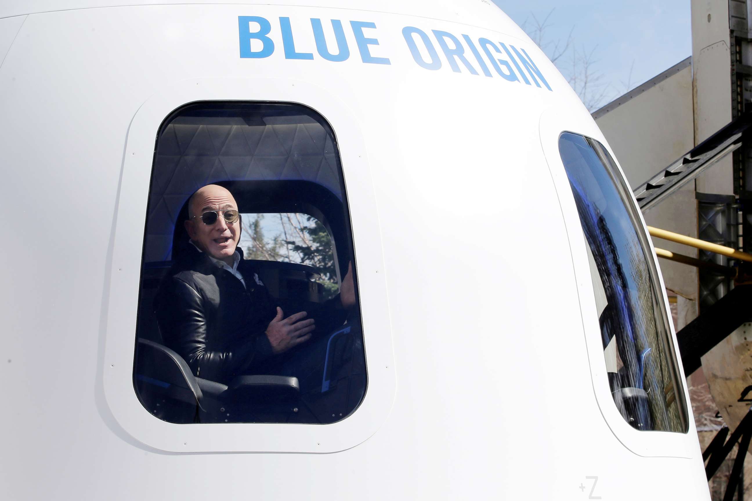 PHOTO:Amazon and Blue Origin founder Jeff Bezos addresses the media about the New Shepard rocket booster and Crew Capsule mockup at the 33rd Space Symposium in Colorado Springs, Colo., April 5, 2017. 