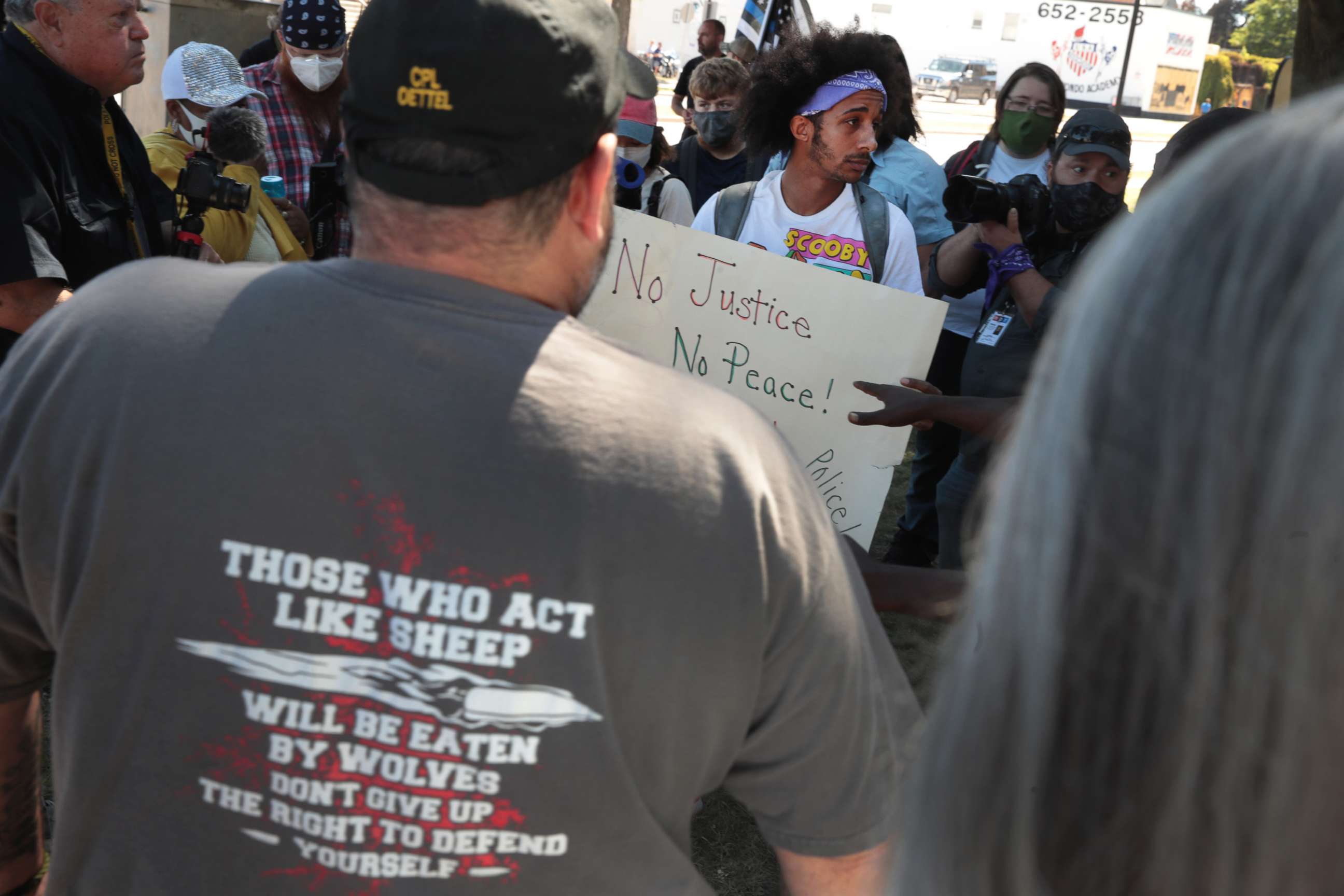 PHOTO: Stan Easley (C) speaks to a group of demonstrators holding a Back the Blue Rally in front of the Kenosha County Courthouse on August 30, 2020 in Kenosha, Wisconsin. 