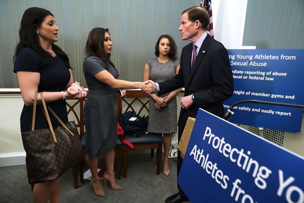 PHOTO: (L-R) 1996 Olympic Gold Medalist Dominique Moceanu, and former National Team members Jeanette Antolin and Mattie Larson are shown with Sen. Richard Blumenthal following a news conference, March 28, 2017, in Washington, D.C.