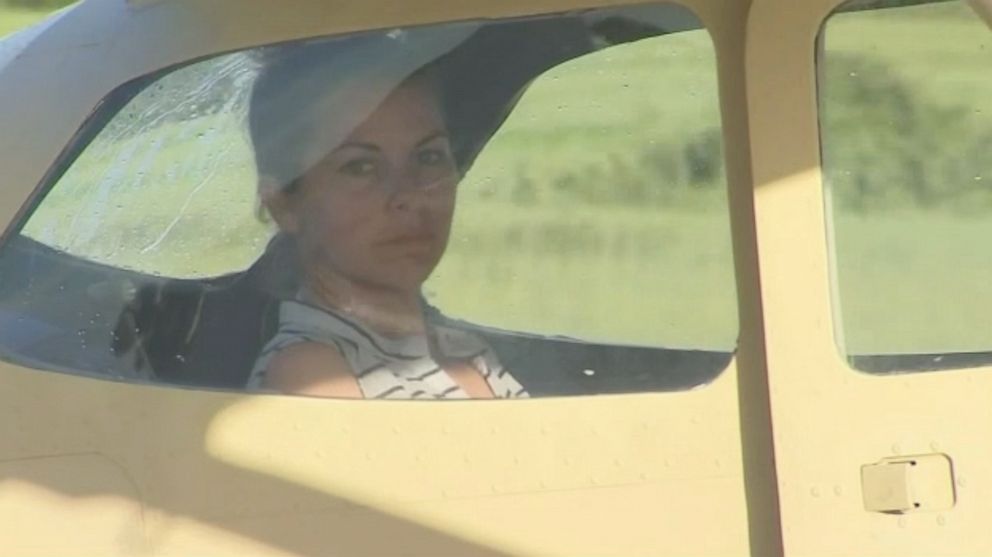 PHOTO: Natasha Walker is seen in a plane taking off to search for her husband, Justin Walker and Brian McCluney who went missing while fishing.