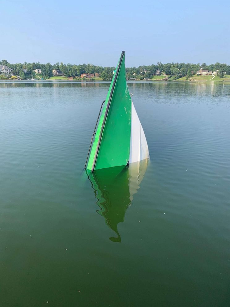 PHOTO: Georgia authorities said this partially submerged cigarette boat was involved in a fatal collision on Lake Tobesofkee in Macon, Ga., on July 24, 2021.