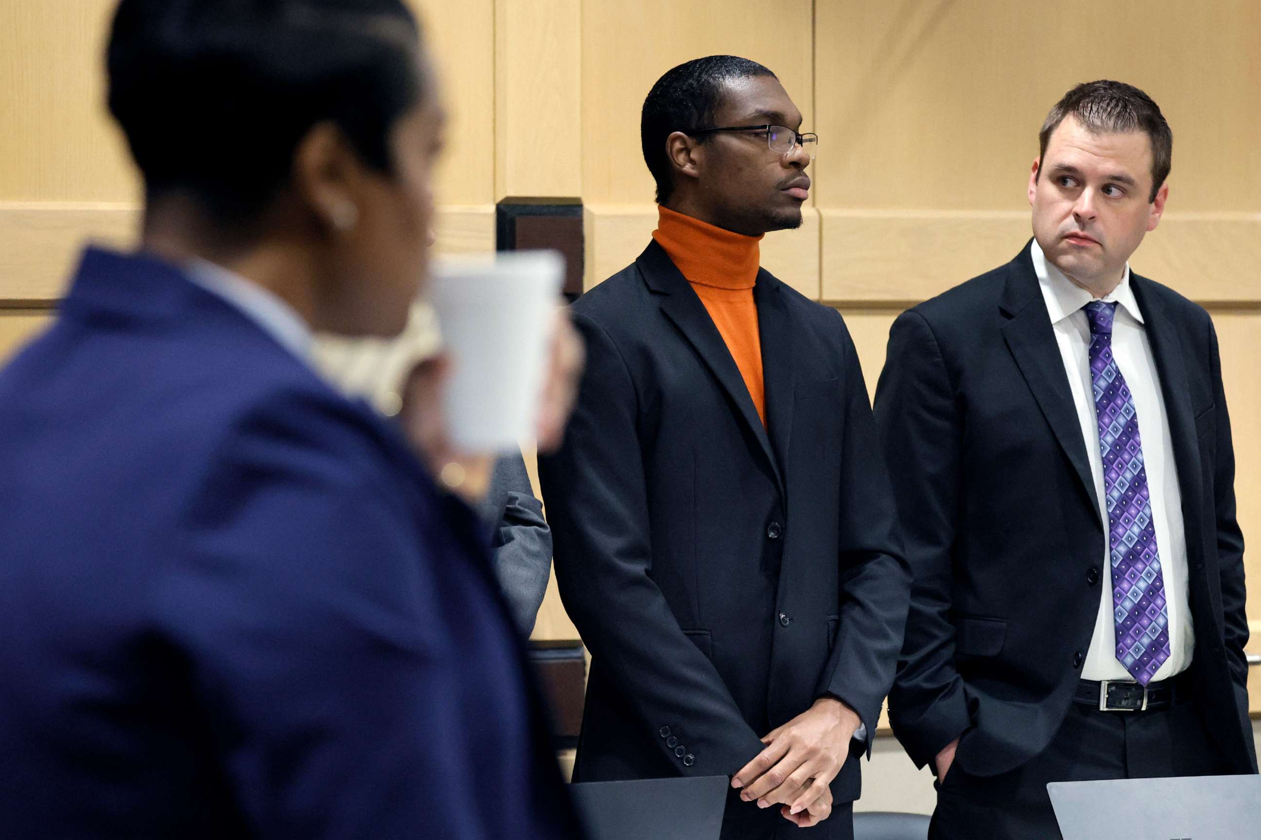 PHOTO: Shooting suspect Michael Boatwright, center, stands for the jury to enter the courtroom for closing arguments in the XXXTentacion murder trial at the Broward County Courthouse in Fort Lauderdale, Fla., March 7, 2023.