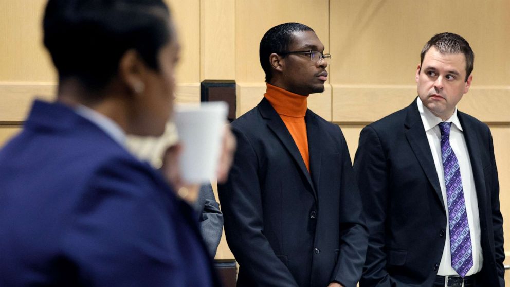 PHOTO: Shooting suspect Michael Boatwright, center, stands for the jury to enter the courtroom for closing arguments in the XXXTentacion murder trial at the Broward County Courthouse in Fort Lauderdale, Fla., March 7, 2023.