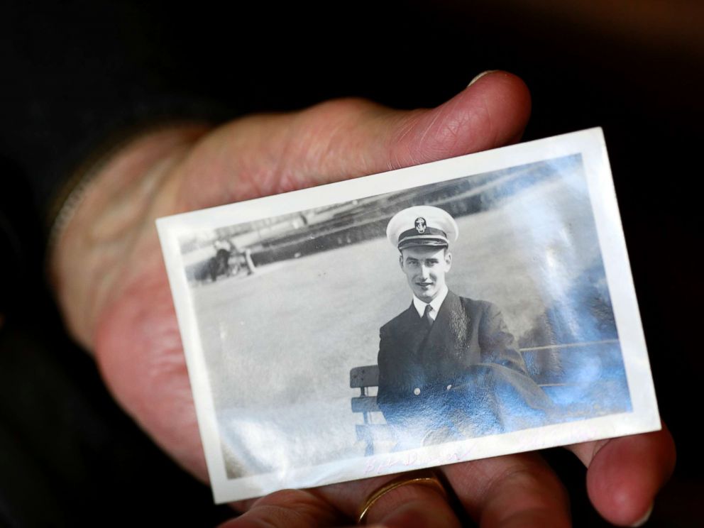 PHOTO: World War II veteran Bob Barger holds a photo of himself taken on Oct. 9, 1943, when he was serving in the U.S. Navy.