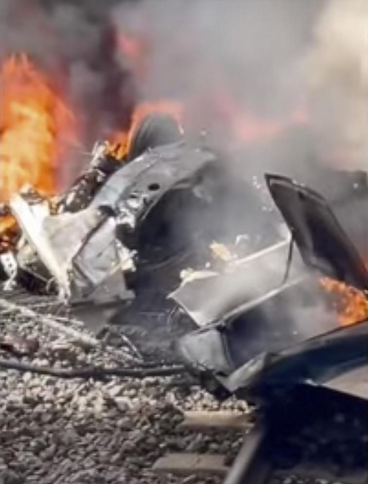 PHOTO: The wreckage of a small plane burns after crashing in Boca Raton, Fla., Apr. 11, 2025.
