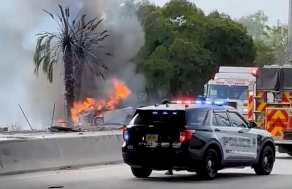 PHOTO: A car burns at the site of a crash in Boca Raton, Florida, April 11, 2025.