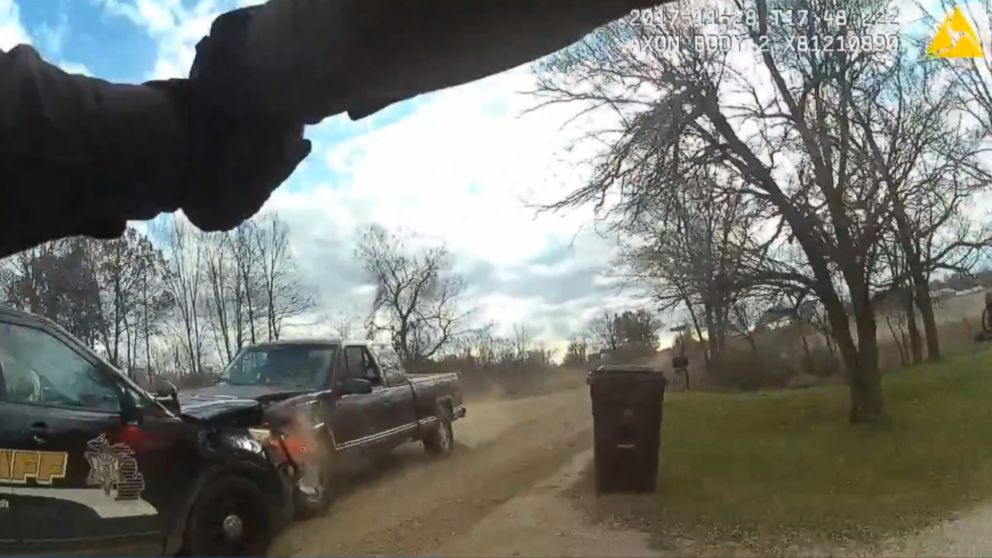 PHOTO: Suspect Robert Smith is seen ramming his pickup truck into officer's vehicles during a November 2017 incident captured on police bodycam video.