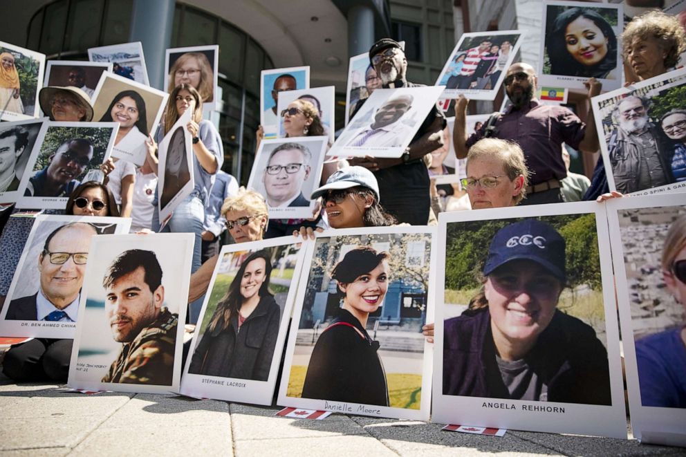 PHOTO:Family members of victims from the Ethiopian Airlines Flight 302 crash hold photographs during a vigil outside the Department of Transportation in Washington, Sept., 10, 2019. 