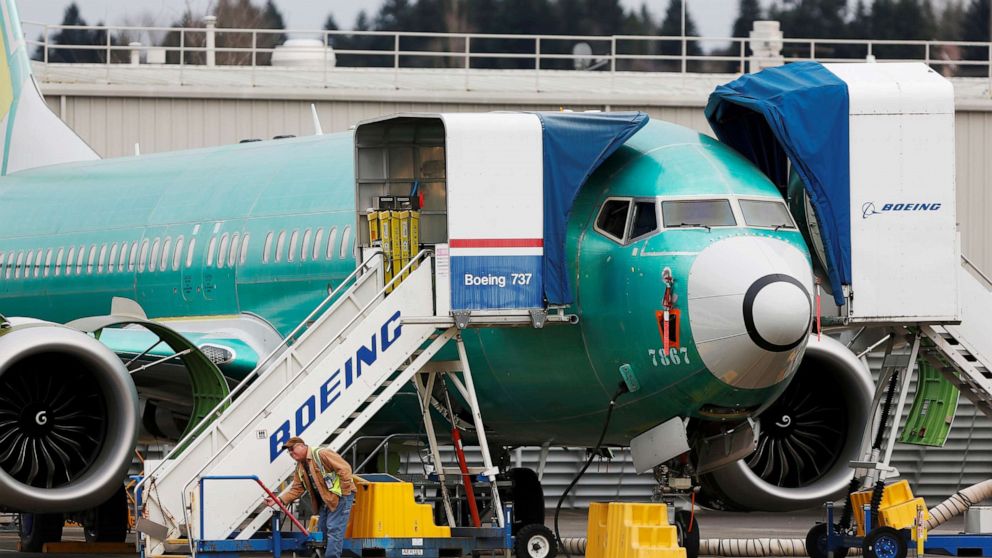 PHOTO: An employee works near a Boeing 737 Max aircraft at Boeing's 737 Max production facility in Renton, Wash., on Dec. 16, 2019.