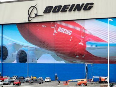 Boeing locks out its firefighters amid union fight for pay