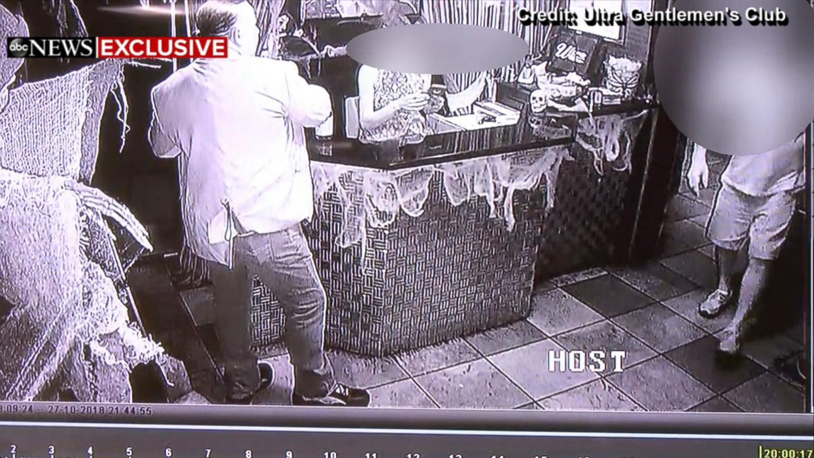 EXCLUSIVE: Surveillance video shows alleged mail bomber reading newspapers  at strip club night before arrest - ABC News