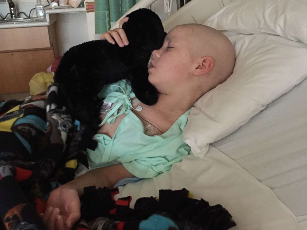 PHOTO: A.J. is photographed here as he receives treatment for leukemia in this family photo.