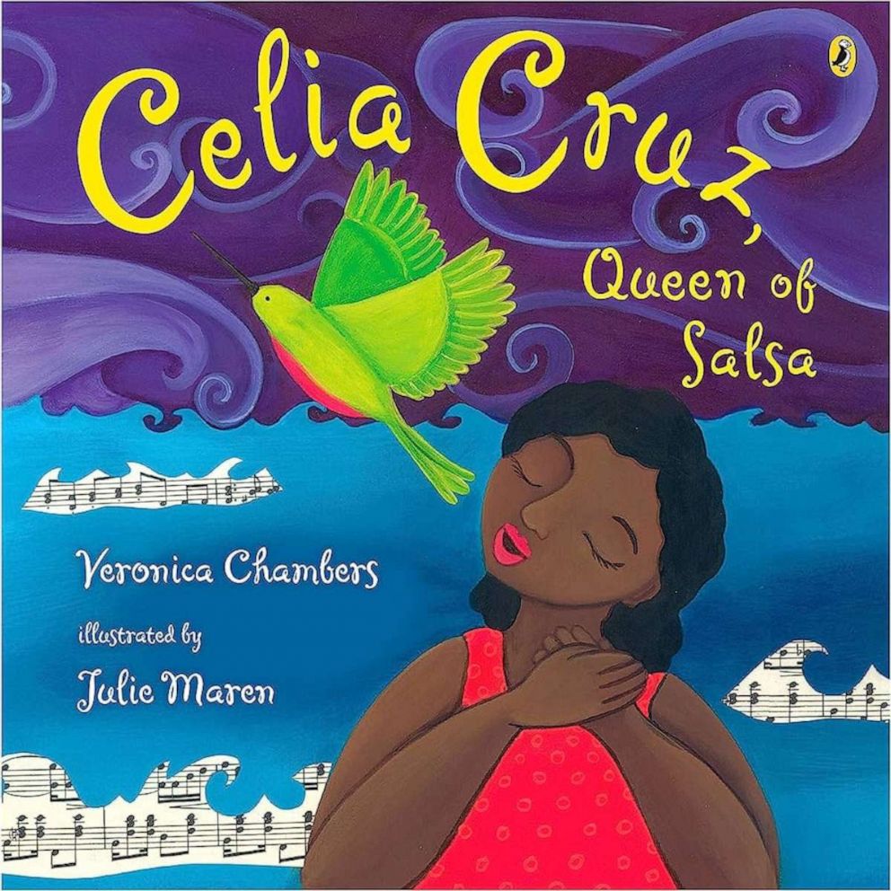 PHOTO: Celia Cruz, Queen of Salsa Paperback – Illustrated, July 19, 2007, by Veronica Chambers (Author), Julie Maren (Illustrator).