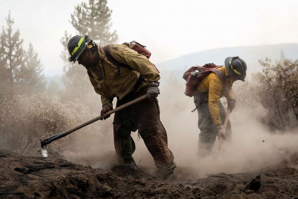 PHOTO: Firefighters from New Mexico work amidst heavy ash and dust to help contain the Bootleg Fire near Silver Lake, Oregon, July 29, 2021.