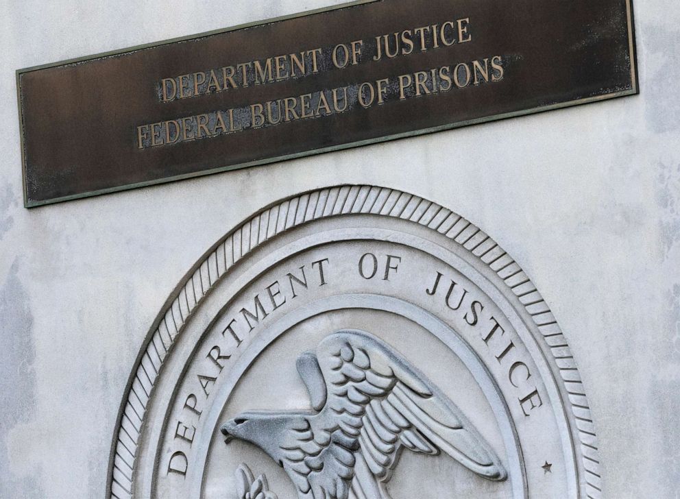 PHOTO: A sign for the Department of Justice Federal Bureau of Prisons is displayed at the Metropolitan Detention Center in the Brooklyn, New York.