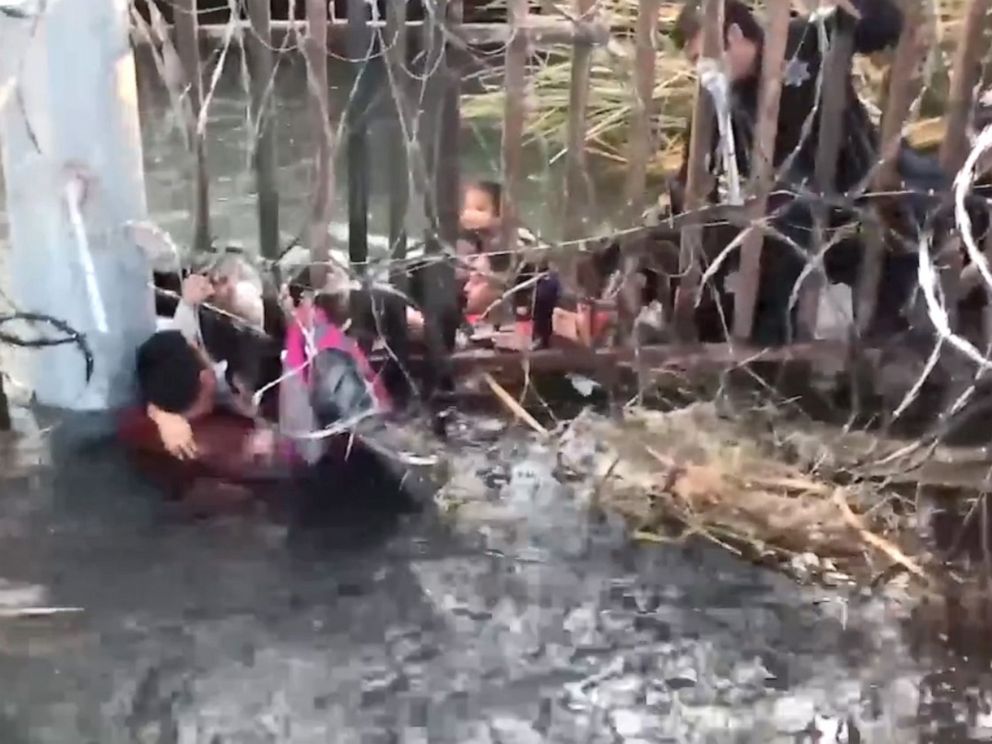 PHOTO: A still from video taken by U.S. Customs and Border Protection officers of people attempting to cross the Mexico-U.S. border at the Sanchez Canal near Yuma, Ariz.