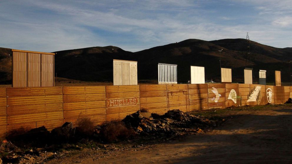 Prototypes for the border wall with Mexico are seen behind the current border fence in Tijuana, Mexico, Jan. 27, 2018.