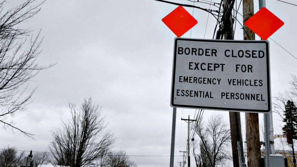 PHOTO: A sign in Derby Line, Vermont warning drivers that the international border with Canada is closed to non-essential travelers