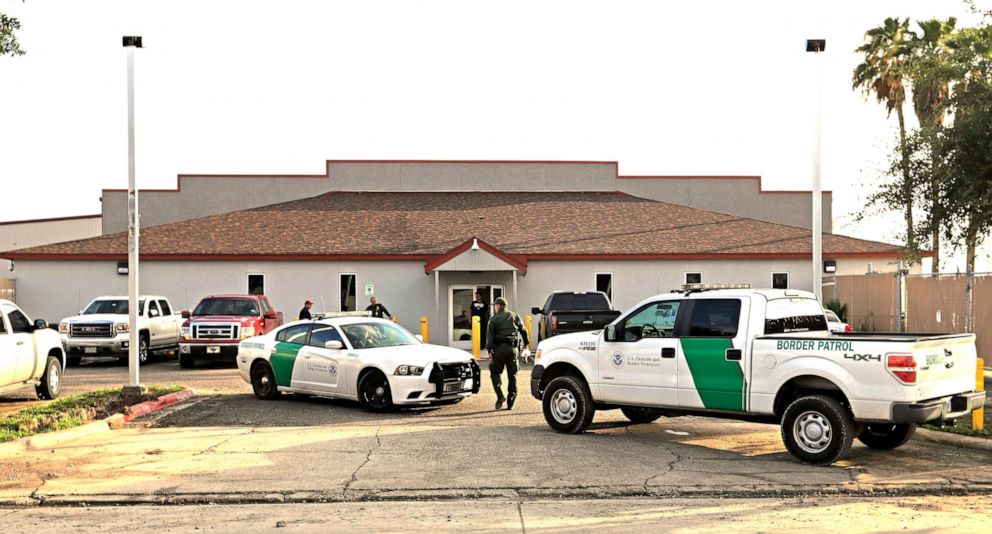 PHOTO: A U.S. Border Patrol Agent walks outside the Central Processing Center in McAllen, Texas.
