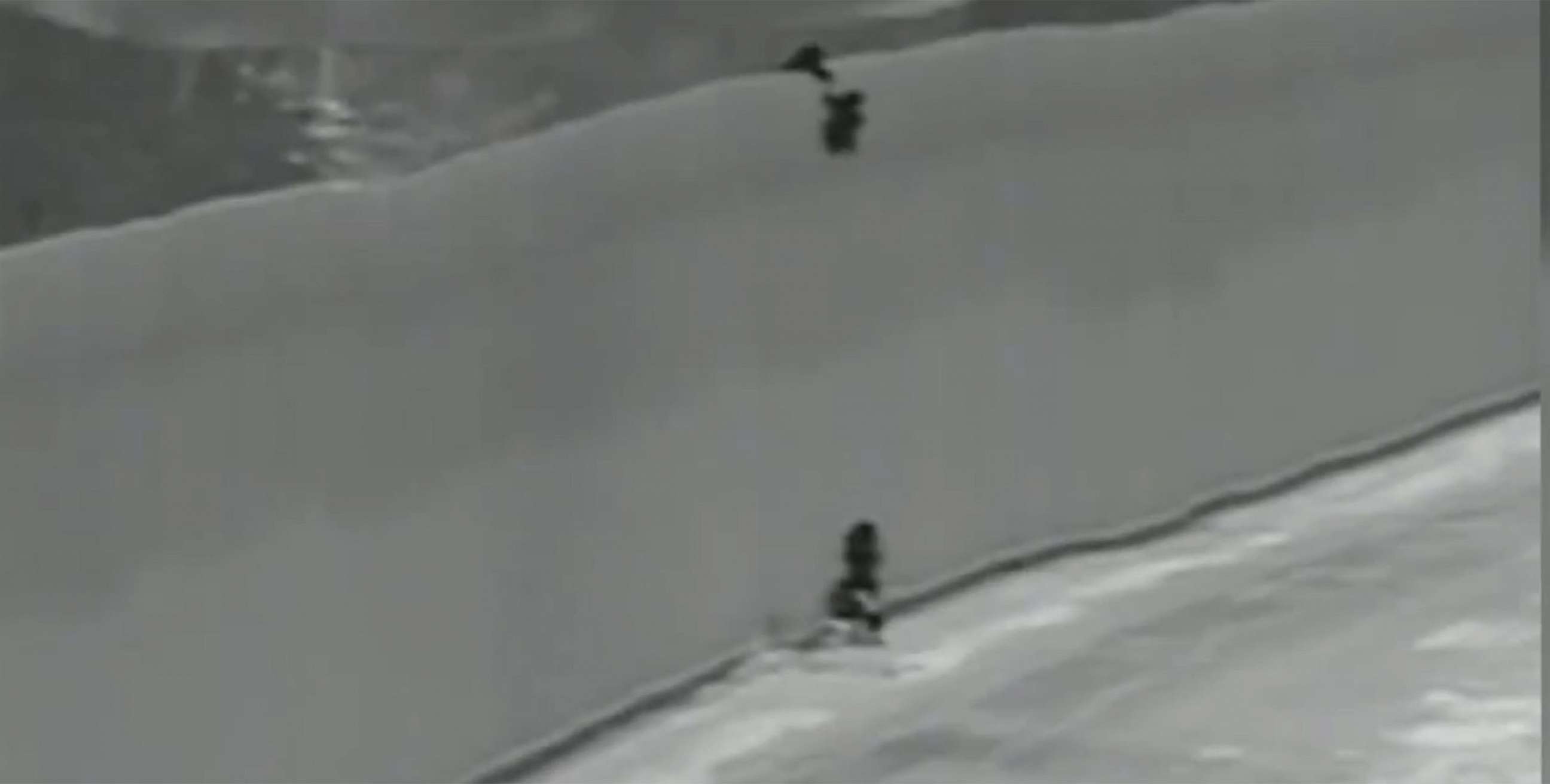 PHOTO: Video released by the United States Border Patrol shows a mother and 2 chidren as they are lowered from the 30 foot border wall between Mexico and California.
