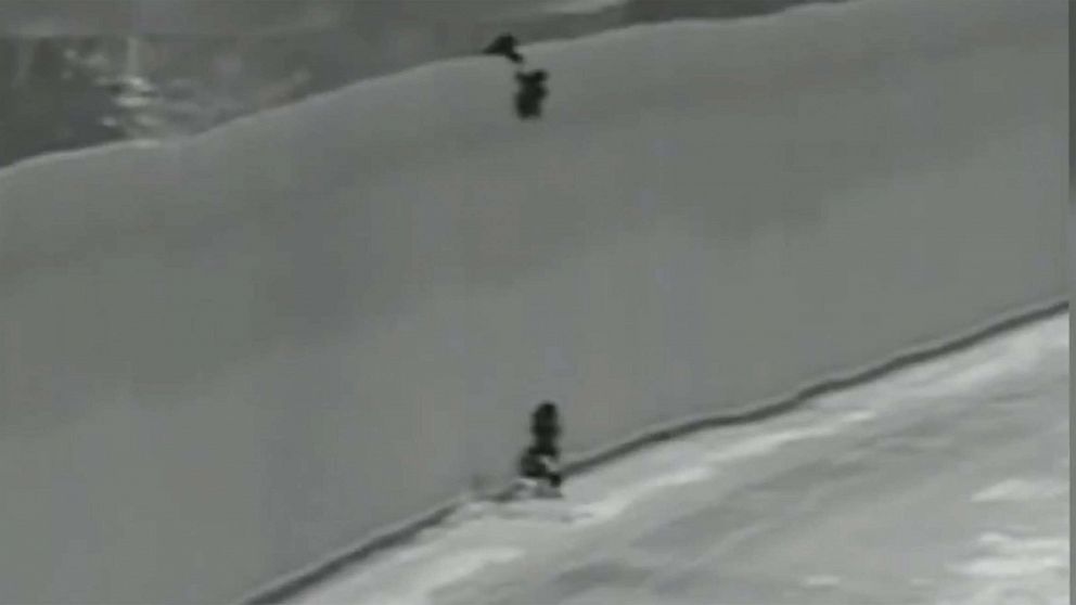 Video shows 3 adults, 2 children lowered down 30-foot border wall by rope in California