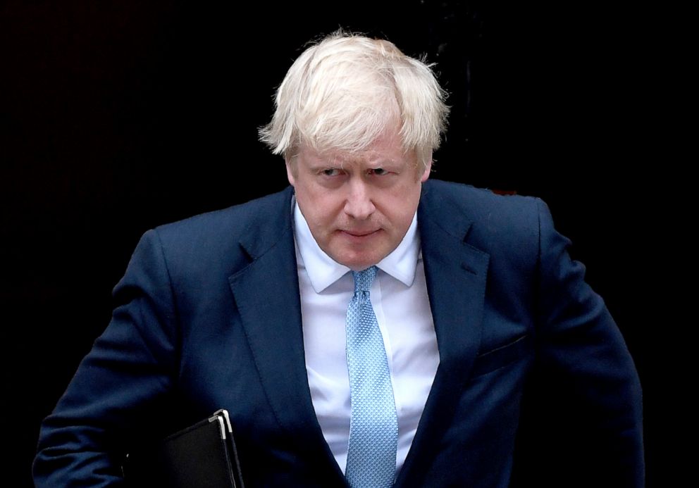 PHOTO: Britains Prime Minister Boris Johnson walks towards a podium to speak to the media outside 10 Downing Street in London, Sept. 2, 2019.