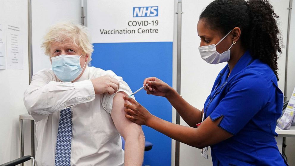 PHOTO: Britain's Prime Minister Boris Johnson receives his COVID-19 booster at a vaccination clinic at St. Thomas' Hospital in central London, Dec. 2, 2021.