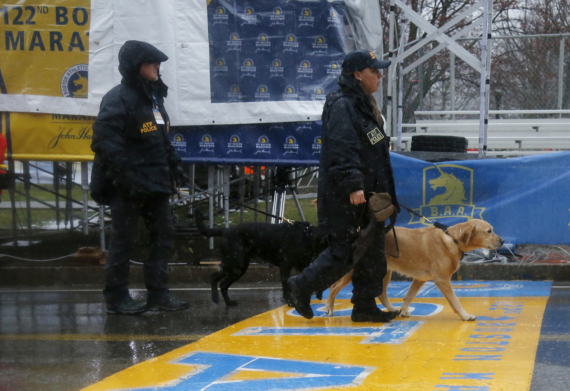 PHOTO: ATF K-9 units cross the start line during a security patrol before the start of the 122nd running of the Boston Marathon in Hopkinton, Mass., April 16, 2018. 