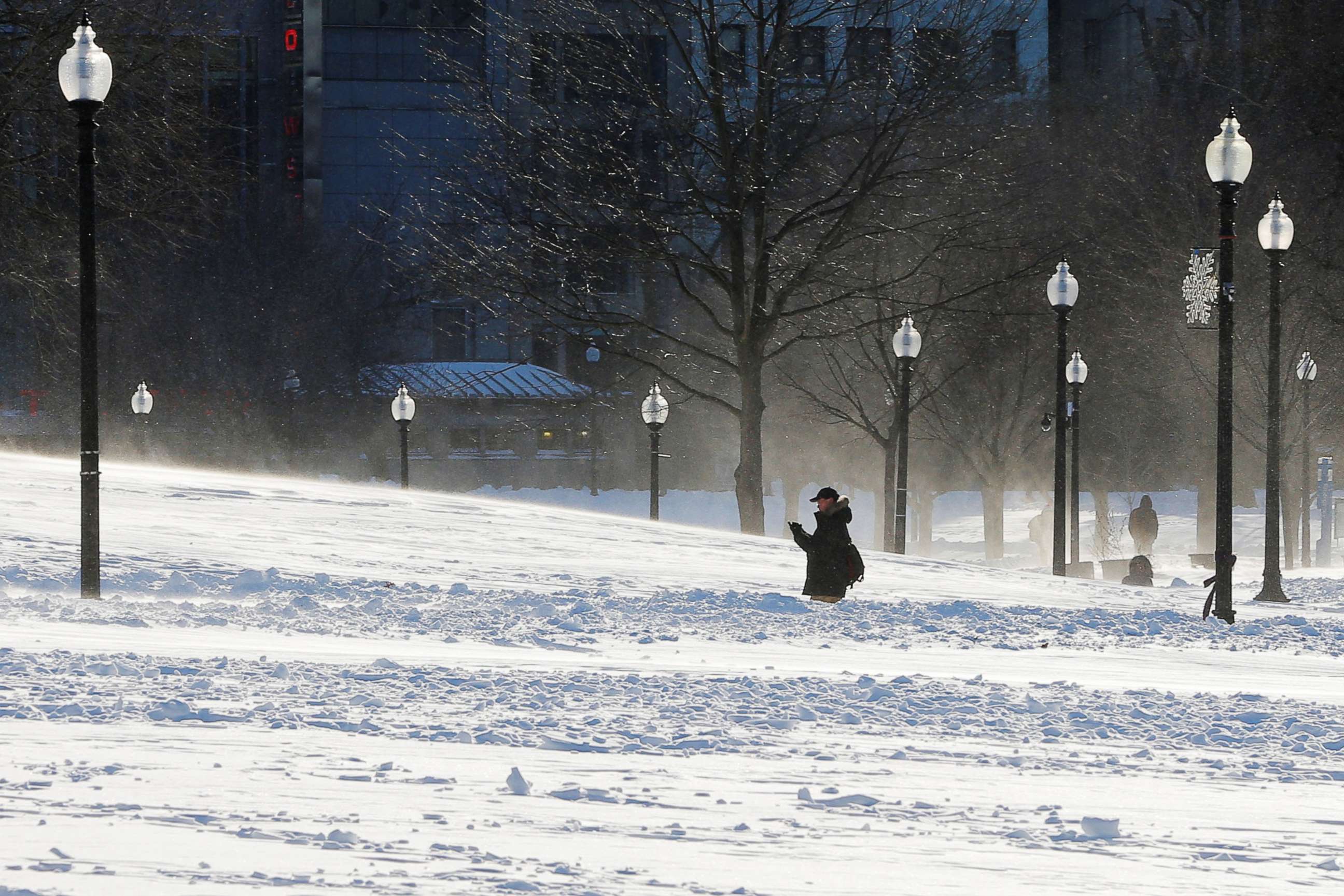 PHOTO: A man walks across Boston Common following winter snow storm in Boston, Mass., Jan. 5, 2018.