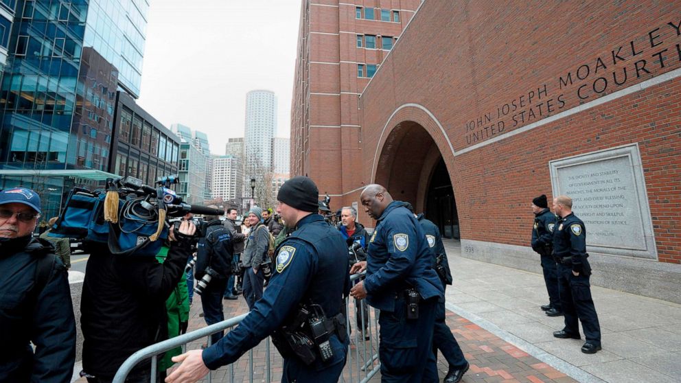 PHOTO: Police set up barricades at the John Joseph Moakley United States Courthouse during a hearing on the college admissions scandal on March 29, 2019, in Boston.