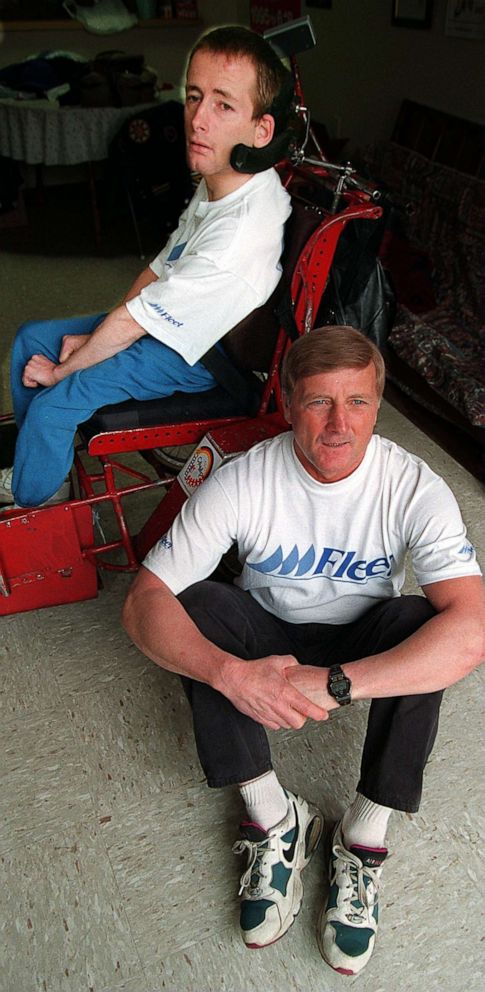 PHOTO: Dick Hoyt poses with his son Rick in Boston, April 5, 1996.