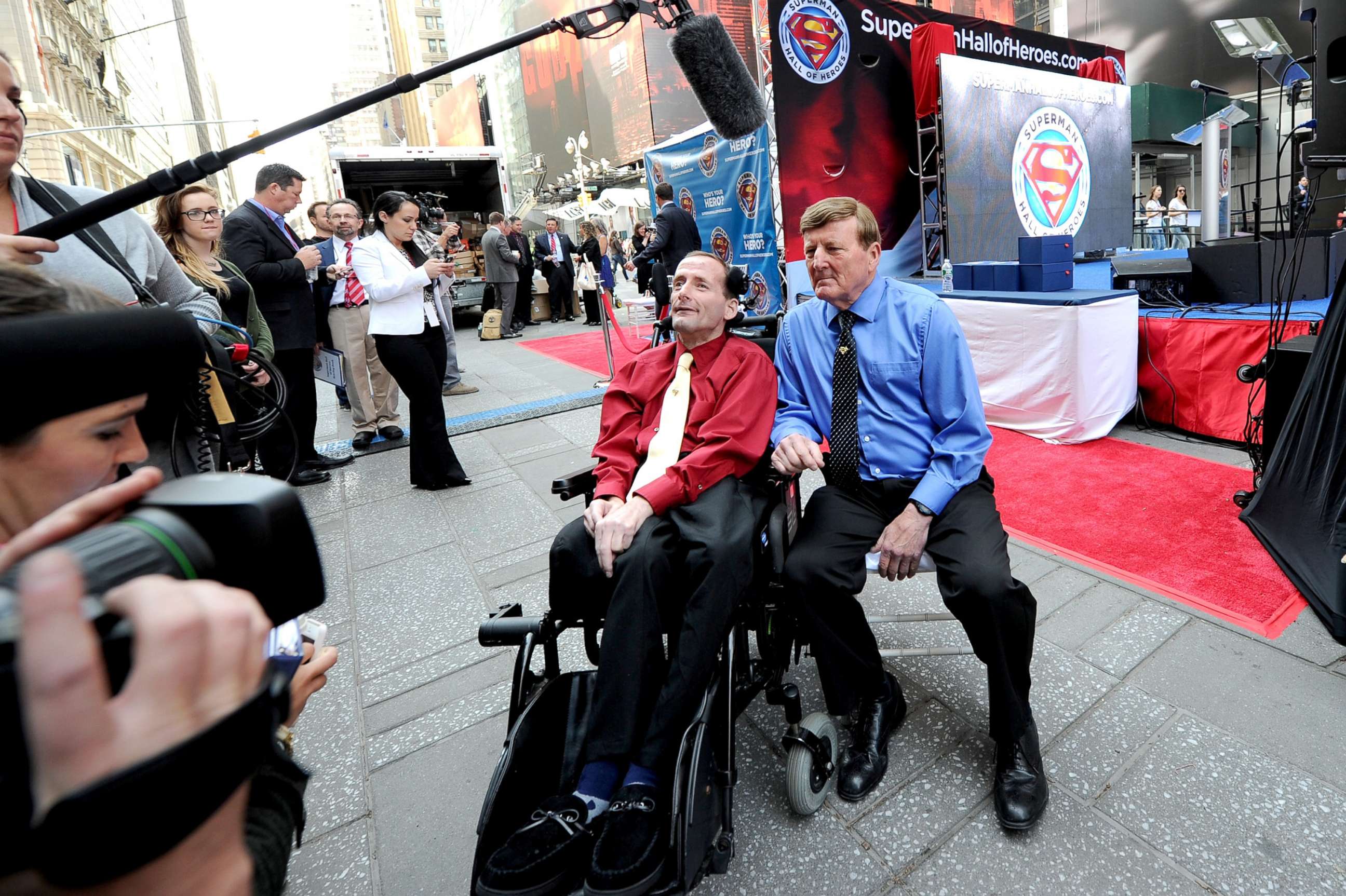 PHOTO: Rick Hoyt and Dick Hoyt participate in a media interview at Superman Hall Of Heroes inaugural event at Times Square in New York, May 13, 2014.