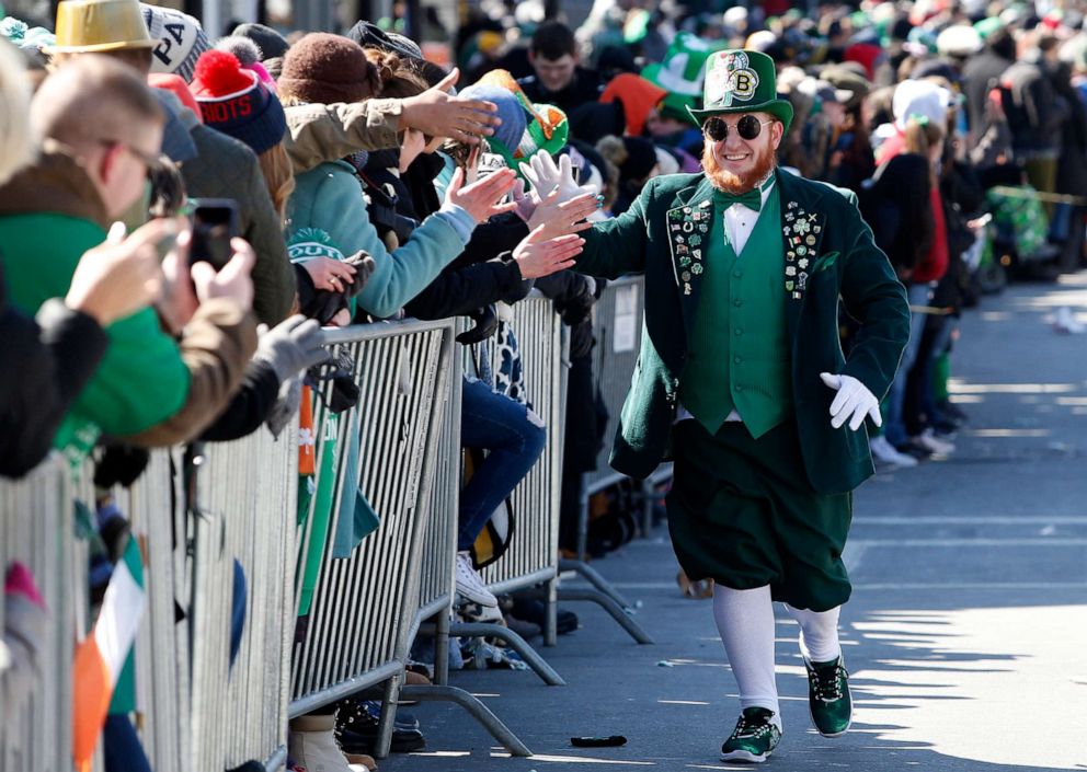 PHOTO: Matt Casey, dressed as a Leprechaun, greets people along the annual St. Patrick's Day parade route in South Boston on March 18, 2018.