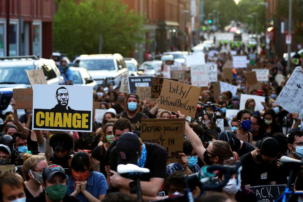PHOTO: Protesters gather in front of the Boston Police District E-13 Jamaica Plain office during a protest on June 04, 2020, in Boston.
